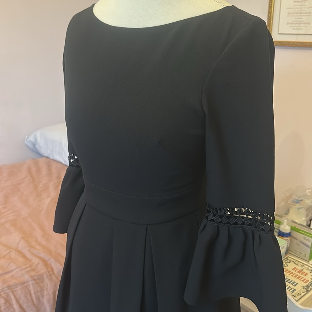 Eliza J black dress, with pockets, size 4 lined 
Worn once